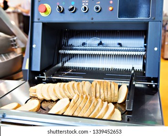 Sliced White Bread In A Cutting Machine