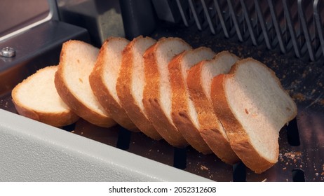 Sliced White Bread In A Cutting Machine