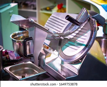 Slicer. Slicing Equipment. Cutting Disc Cuts The Products. Slicer In The Restaurant Kitchen. Equipment For Restaurant Business. Machine For Thin Slicing Food. Kitchen Automation. Hazardous Equipment