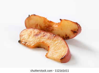 Slices Of Baked Apple Isolated On White