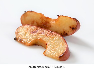 Slices Of Baked Apple Isolated On White