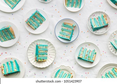 Slices Of Birthday Layer Cake Overhead View