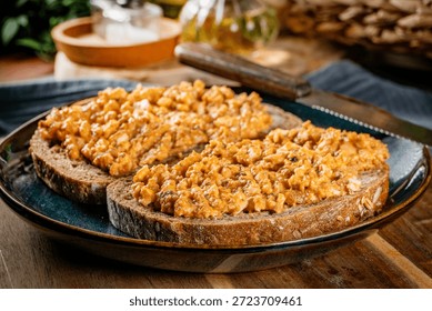 Slices of bread with egg and sprat paste in tomatoes. Selective focus.
