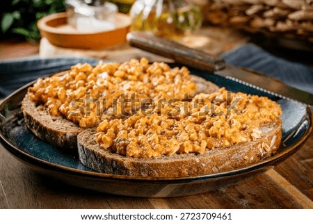 Slices of bread with egg and sprat paste in tomatoes. Selective focus.