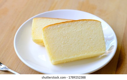 Slices Of Butter Cake On White Plate