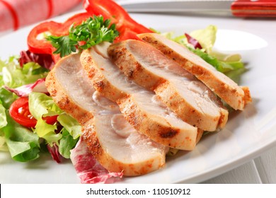 Slices Of Chicken Breast Fillet With Green Salad
