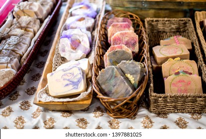 Slices Of Decorative Hand Made Lye Soap Are Displayed At A Craft Sale