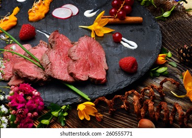 Slices Of Duck Fried Meat In Fancy Food Arrangement