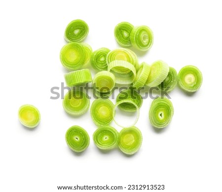 Slices of fresh leek on white background