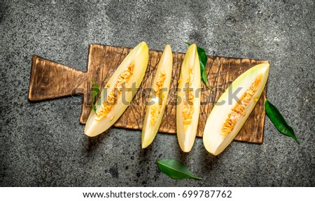 Similar – Foto Bild Stück reife Melone mit Samen