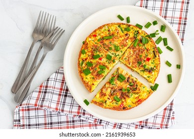 Slices Of Frittata Omelette In A Plate Top Down Photo On White Background