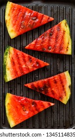 Slices Of Grilled Watermelon In Grilling Pan, Top View. Flat Lay, Overhead. Close-up.