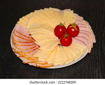 slices of ham cheese and tomatoes as an exquisite treat - Shutterstock ID 2212748209