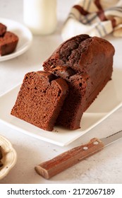 Slices Of Homemade Dark Chocolate Cake On A Platter