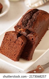 Slices Of Homemade Dark Chocolate Cake On A Platter