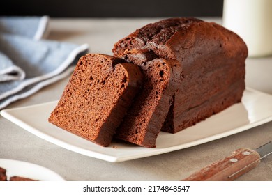 Slices Of Homemade Dark Chocolate Cake On A Platter