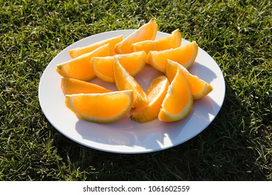 Slices Of Orange On A Plate