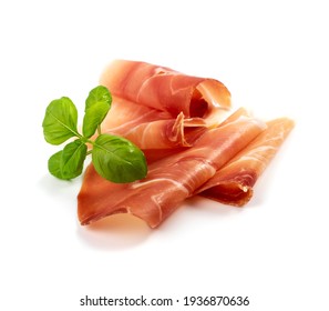 Slices of prosciutto isolated. Spanish jamon cut, parma ham, serrano or iberico on white background closeup - Shutterstock ID 1936870636