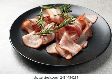 Slices of raw bacon and rosemary on light grey table, closeup - Powered by Shutterstock