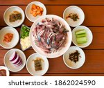 Slices of raw mackerel on a dish with side dishes at Yokjido Island near Tongyeong-si, South Korea
