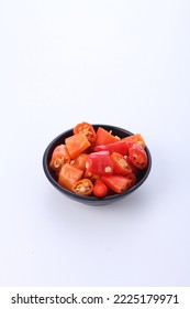 Slices Of Red Cayenne Pepper On A White Background