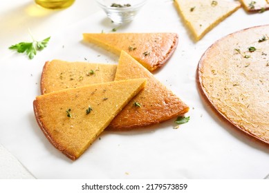 Slices Of Socca Gluten-free Chickpea Flatbread.