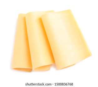 Slices Of Tasty Cheese On White Background, Top View