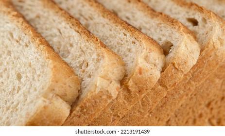 Slices of toast bread close up. Traditional bread for cooking toast - Powered by Shutterstock