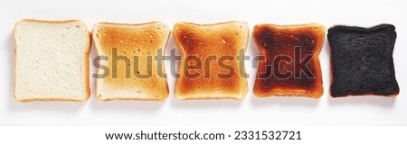 Slices of toasted bread, fresh, fried and burnt on white background, top view