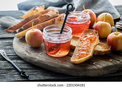 Slices Of Toasted Sourdough Bread With Fresh Homemade Crab Apple Jelly.