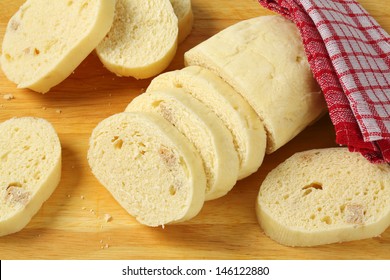 Slices Of Traditional Czech Dumplings On A Cutting Board