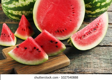 Slices of watermelons on cutting board