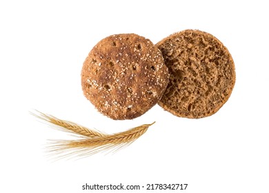 Slices of whole grain rye traditional scandinavian sandwich bread with spikelets flying isolated on white background. Healthy crusty toast bread for breakfast.