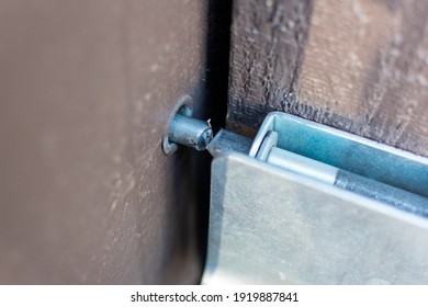 Slide bolt door latch cut with bolt cutter. Selective focus. Close up. - Shutterstock ID 1919887841