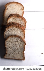Slide bread put on white wooden table prepare for serve in breakfast meal