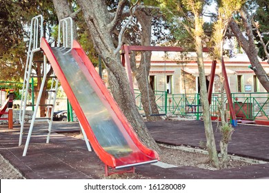 Slide and swings in a children's playground