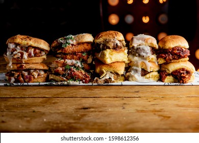 Sliders. Bacon Cheeseburgers. Variety Of Beef Hamburger Sliders. Traditional Classical American Diner Or Bar Food Menu Item Favorite. Variety Of Beef Sliders.