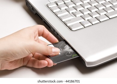 Sliding an ATM card directly into a computer