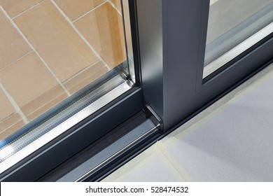 Sliding glass door detail and rail embed in floor