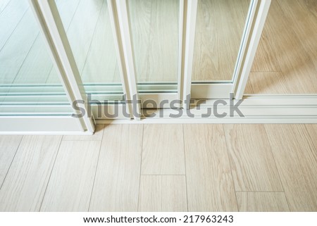 sliding glass door detail and rail embed in wooden floor 