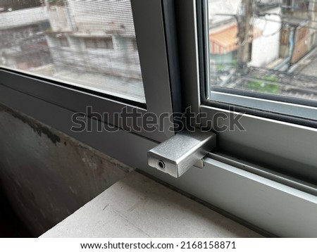 Sliding window lock, Door security hardware. 