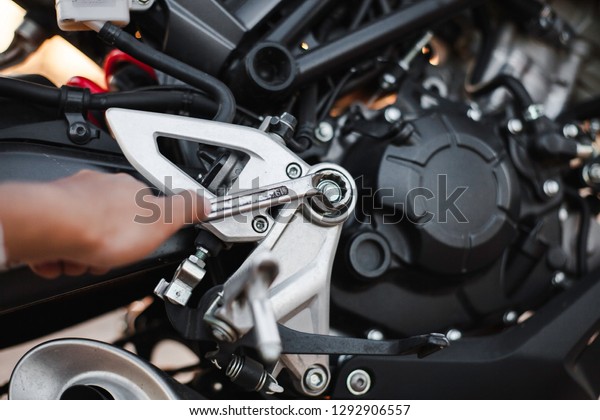 
Sliding wrench Auto repair and big bike
background