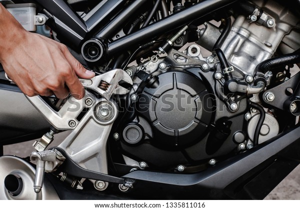 Sliding wrench\
Auto repair and big bike\
background