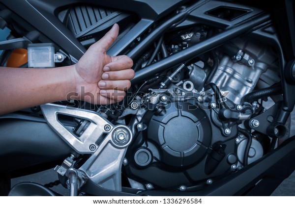 Sliding wrench,Engine,\
Headlight, Nut, Shock absorber, Pump, Disc brake, Wheel, Big bike\
background.