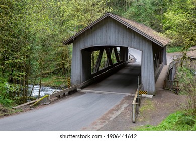 A slight side view of the covered bridge over Cedar Creek along Lewis River in Washington State
