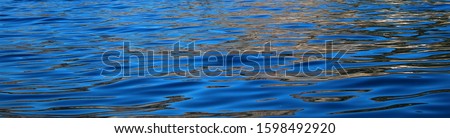 Slightly undulating surface of the sea. Panorama. Sea color, ultramarine blue