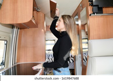 Slim Beautiful Woman Living In Camper Van Motor Rv Home Interior Lifestyle In Vanlife 