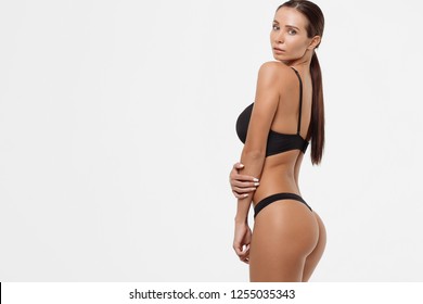 Slim brunette lady in underwear