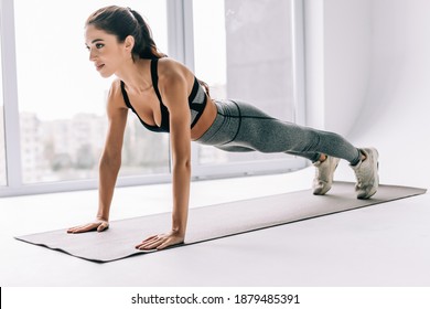 Slim Fitness Woman Athlete Girl Doing Plank Exercise At Home Concept Training Workout Crossfit Gymnastics Cross Fit.