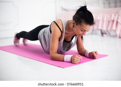 Slim Fitness Young Woman Athlete Girl Doing Plank Exercise At Home Concept Training Workout Crossfit Gymnastics Cross Fit